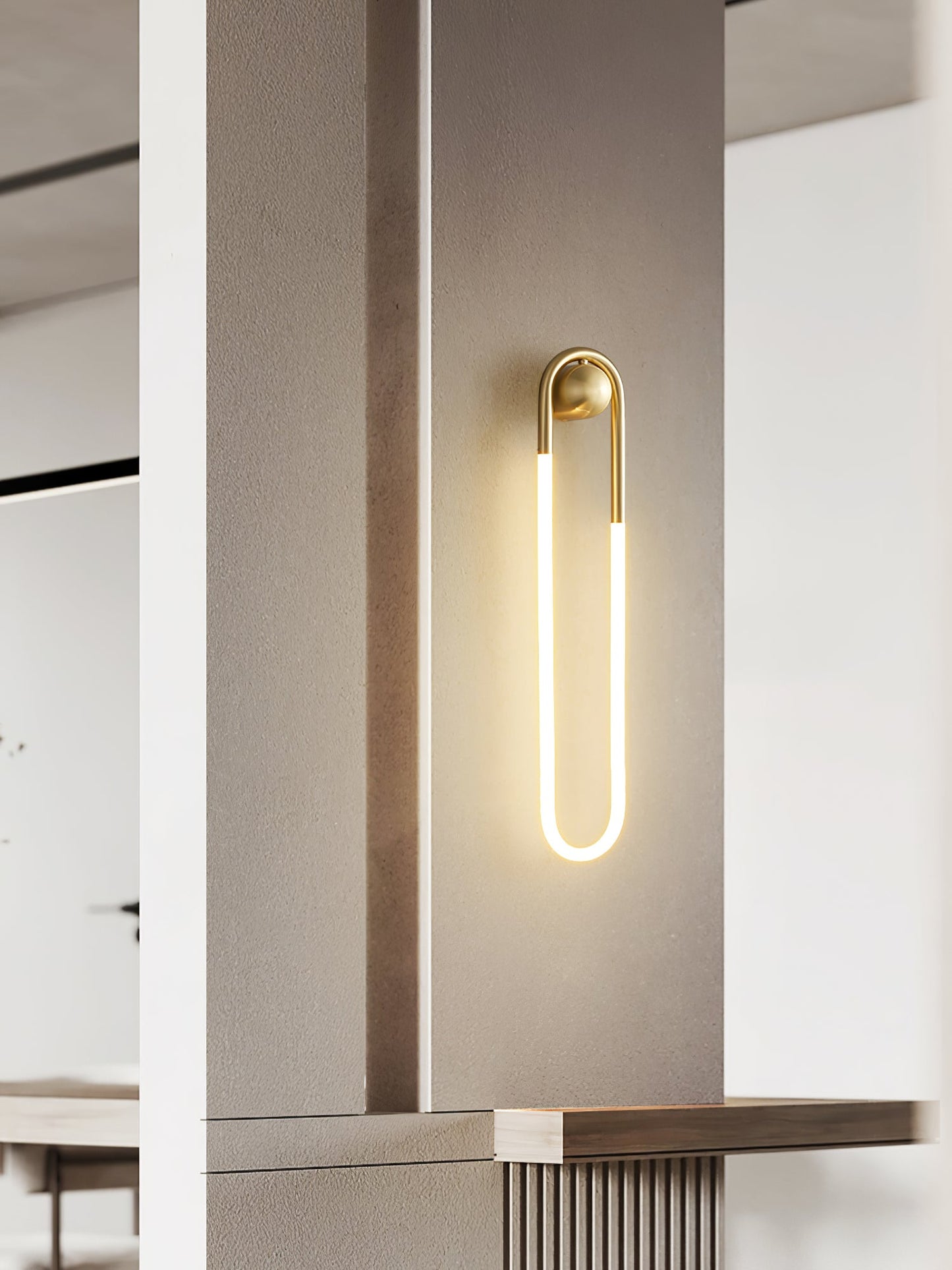Minimalistische Wandleuchte im Loop-Design