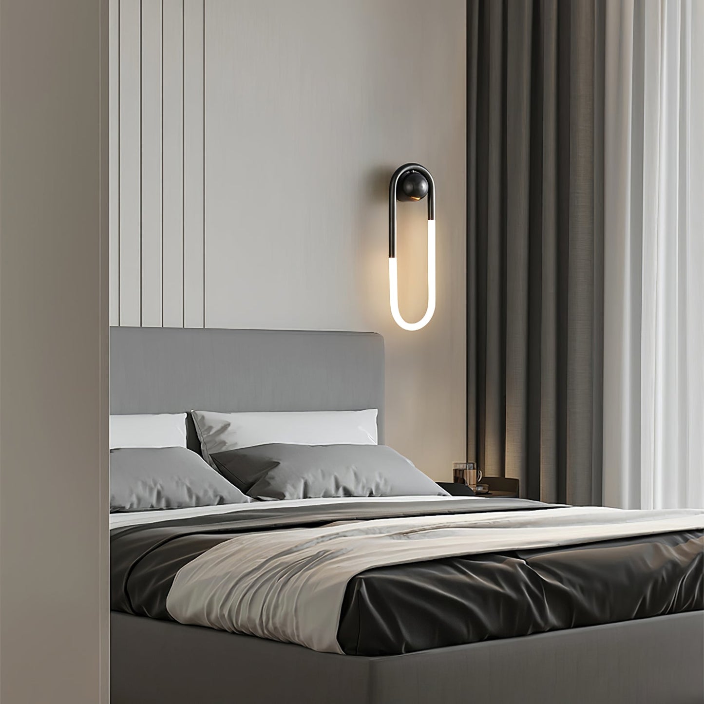 Minimalistische Wandleuchte im Loop-Design
