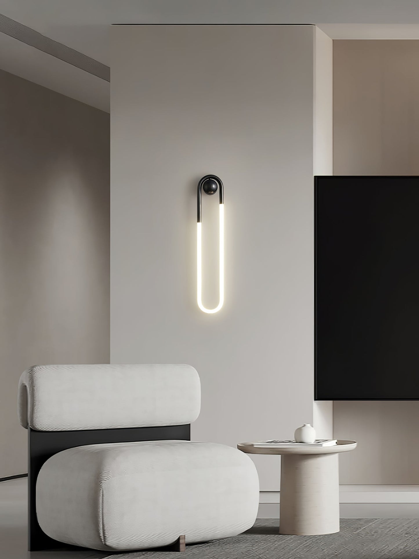 Minimalistische Wandleuchte im Loop-Design