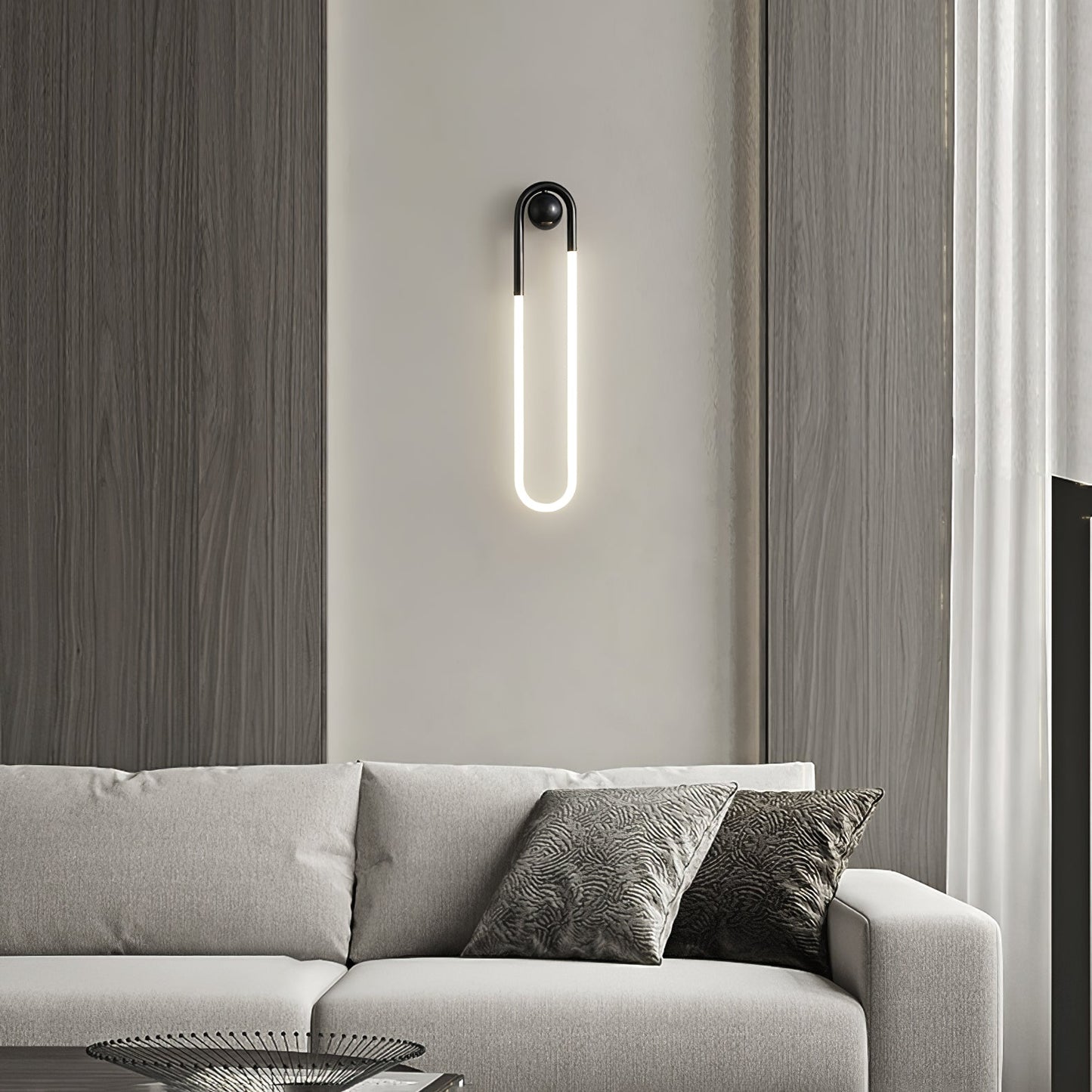 Minimalistische Wandleuchte im Loop-Design