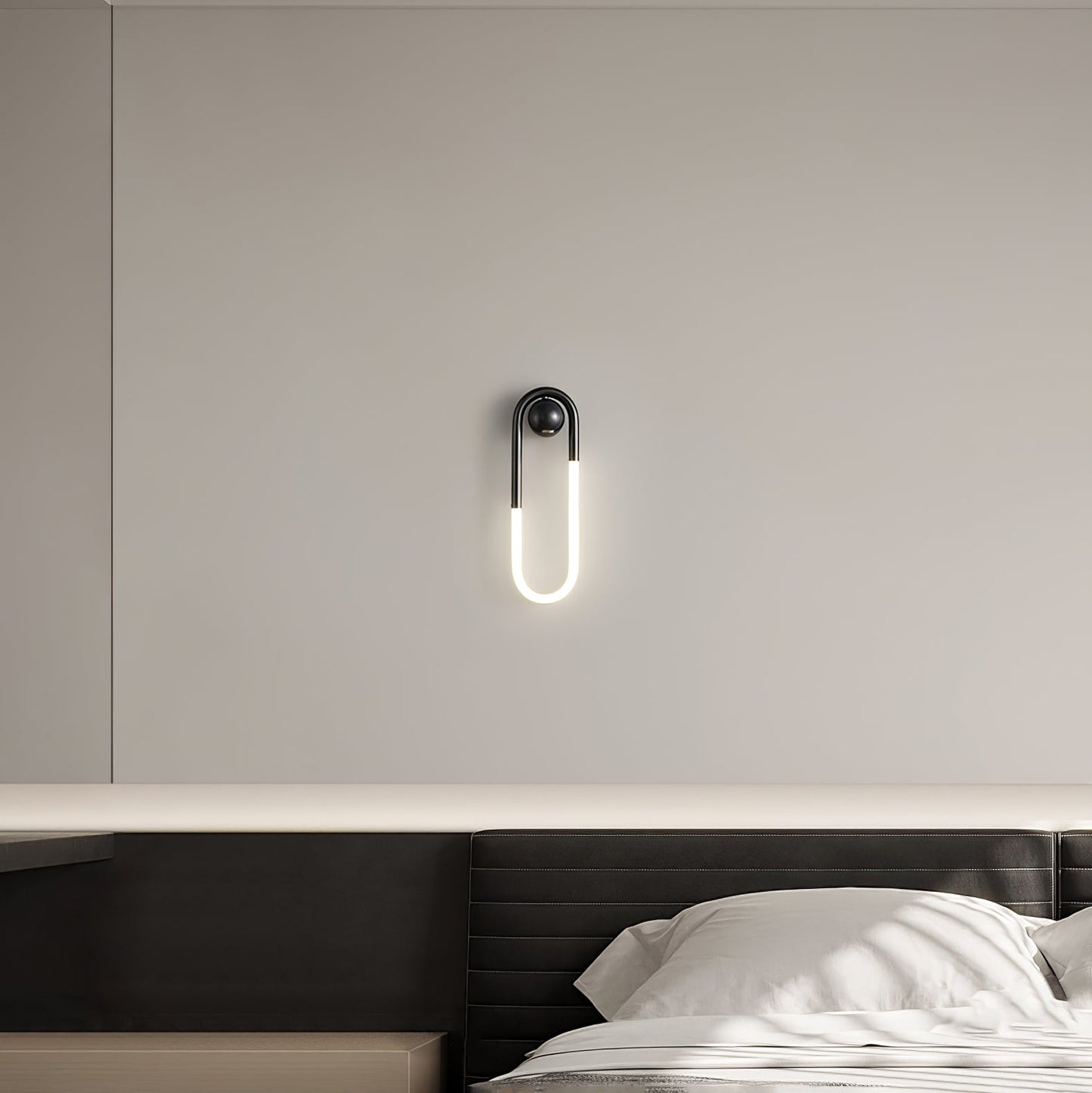 Minimalistische Wandleuchte im Loop-Design