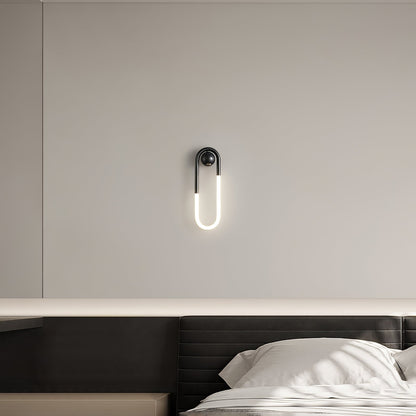 Minimalistische Wandleuchte im Loop-Design