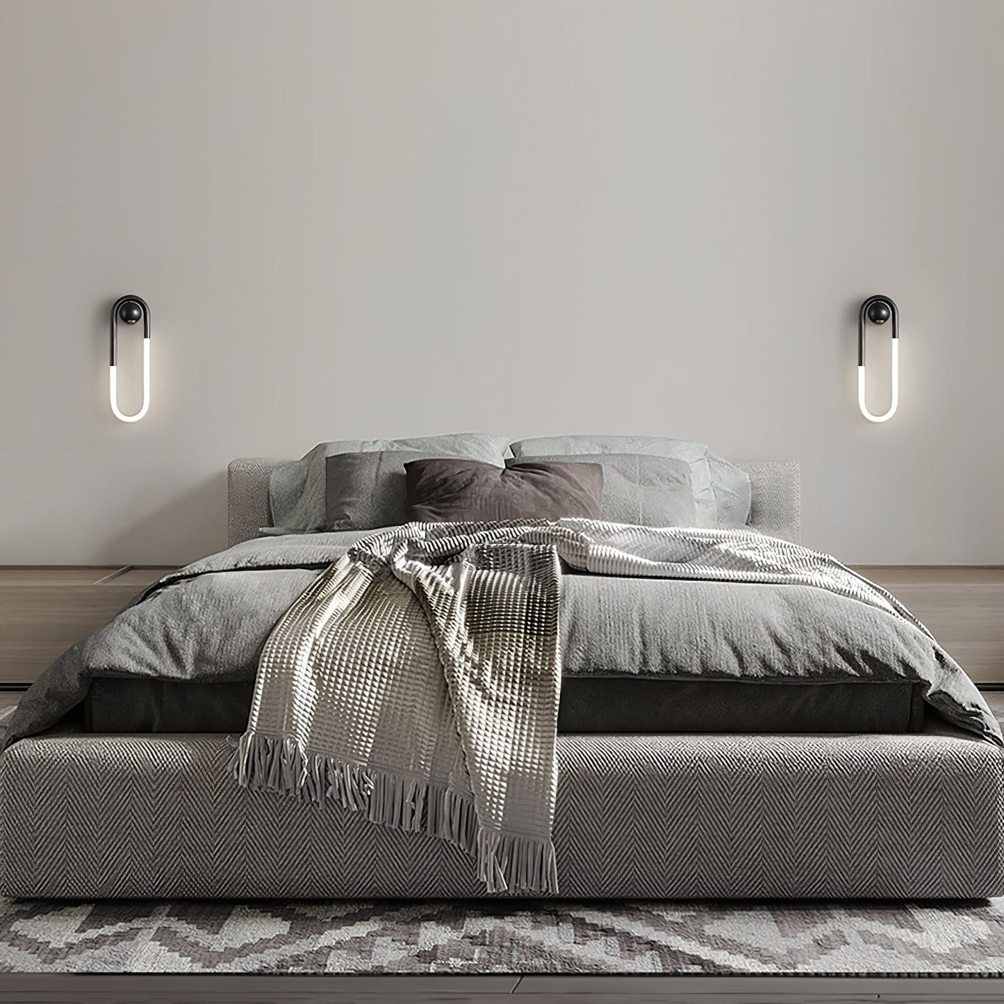 Minimalistische Wandleuchte im Loop-Design