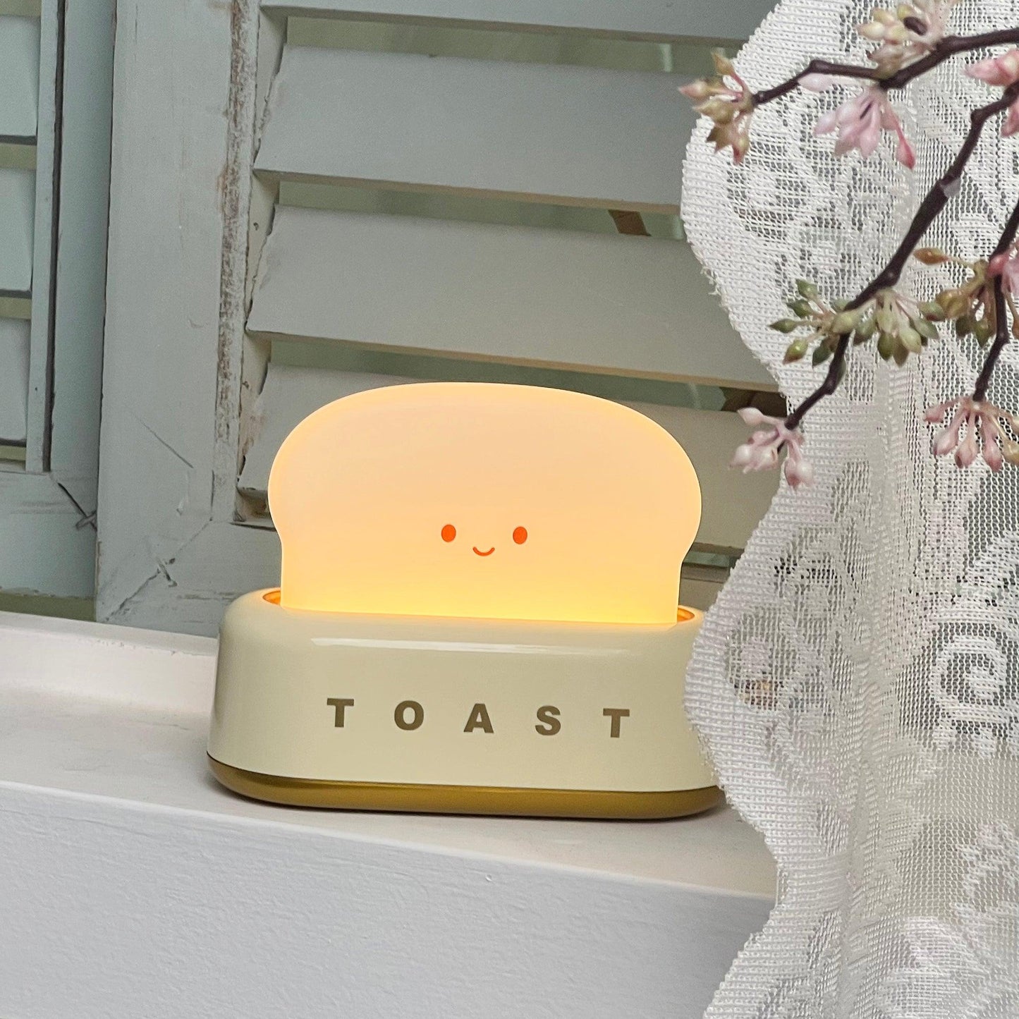 ToastLeuchten: Verspielte Tischlampe im Toaster-Entwurf mit integriertem Akku