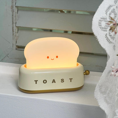 ToastLeuchten: Verspielte Tischlampe im Toaster-Entwurf mit integriertem Akku