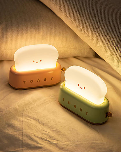 ToastLeuchten: Verspielte Tischlampe im Toaster-Entwurf mit integriertem Akku