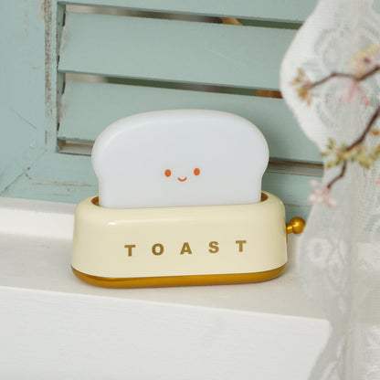 ToastLeuchten: Verspielte Tischlampe im Toaster-Entwurf mit integriertem Akku