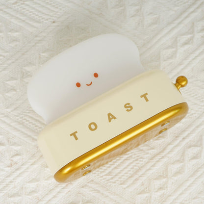 ToastLeuchten: Verspielte Tischlampe im Toaster-Entwurf mit integriertem Akku