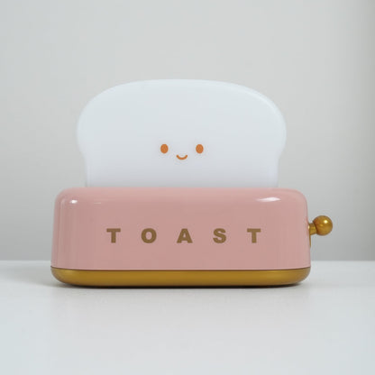 ToastLeuchten: Verspielte Tischlampe im Toaster-Entwurf mit integriertem Akku