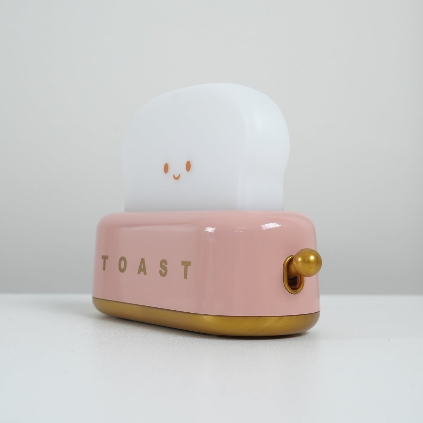 ToastLeuchten: Verspielte Tischlampe im Toaster-Entwurf mit integriertem Akku