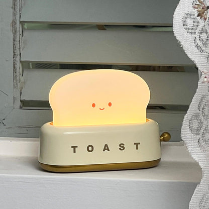 ToastLeuchten: Verspielte Tischlampe im Toaster-Entwurf mit integriertem Akku