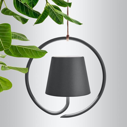 HohlerBogen: Eine minimalistische Tischlampe mit einer offenen, bogenförmigen Silhouette